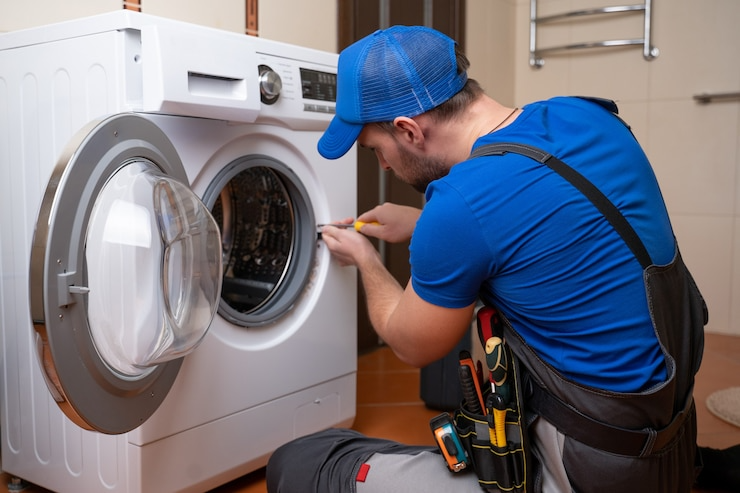 working-man-plumber-repairs-wash